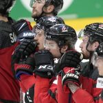 
              Canada's players looking disappointed after losing the group A Hockey World Championship match between Canada and Denmark in Helsinki, Finland, Monday May 23 2022. (AP Photo/Martin Meissner)
            