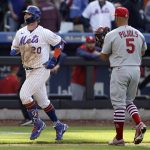 
              New York Mets' Pete Alonso runs past St. Louis Cardinals first baseman Albert Pujols (5) after hitting a walk-off two-run home run during the tenth inning of a baseball game against the St. Louis Cardinals on Thursday, May 19, 2022, in New York. The Mets won 7-6 in 10 innings. (AP Photo/Adam Hunger)
            