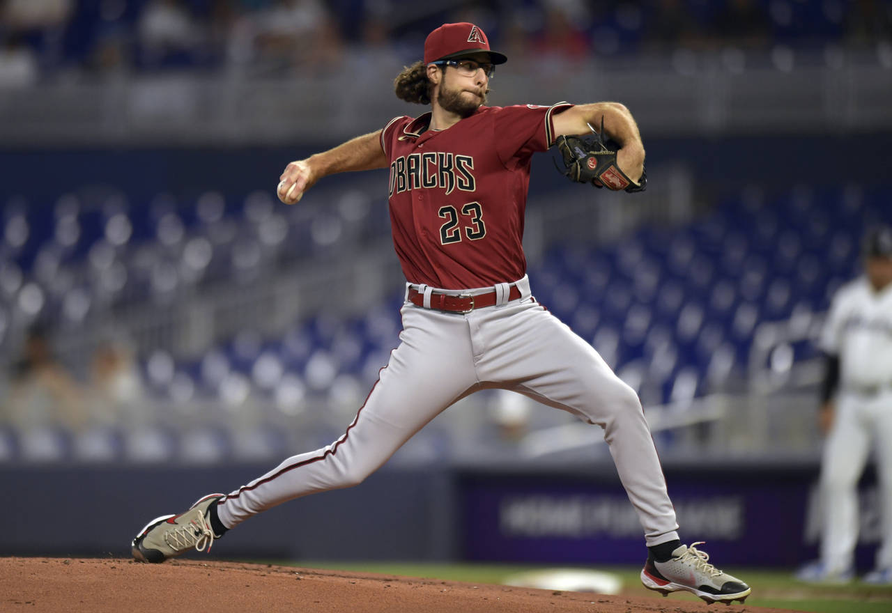 Arizona Diamondbacks starting pitcher Zac Gallen (23) delivers against the Miami Marlins during the...