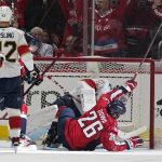 
              Washington Capitals center Nic Dowd (26) celebrates his goal past Florida Panthers goaltender Sergei Bobrovsky (72) during the second period of Game 6 in an NHL hockey Stanley Cup playoffs first-round series Friday, May 13, 2022, in Washington. (AP Photo/Alex Brandon)
            