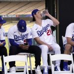 
              Members of the Los Angeles Dodgers, from left,Cody Bellinger, Mookie Betts, Walker Buehler and Clayton Kershaw listen during an event to officially launch the countdown to MLB All-Star Week Tuesday, May 3, 2022, at Dodger Stadium in Los Angeles. The All-Star Game is scheduled to be played on July 19. (AP Photo/Mark J. Terrill)
            