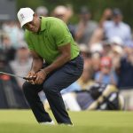 
              Tiger Woods reacts after missing a putt on the sixth hole during the second round of the PGA Championship golf tournament at Southern Hills Country Club, Friday, May 20, 2022, in Tulsa, Okla. (AP Photo/Eric Gay)
            