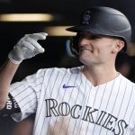 
              Colorado Rockies' Sam Hilliard is congratulated as he returns to the dugout after hitting a three-run home run off Kansas City Royals starting pitcher Carlos Hernandez during the third inning of a baseball game Saturday, May 14, 2022, in Denver. (AP Photo/David Zalubowski)
            