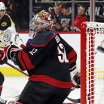 
              Carolina Hurricanes goaltender Antti Raanta (32) watches a shot from the Boston Bruins pass by during the third period of Game 7 of an NHL hockey Stanley Cup first-round playoff series in Raleigh, N.C., Saturday, May 14, 2022. (AP Photo/Karl B DeBlaker)
            