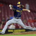 
              Milwaukee Brewers' Josh Hader throws during the ninth inning of a baseball game against the Cincinnati Reds in Cincinnati, Tuesday, May 10, 2022. The Brewers won 5-4. (AP Photo/Aaron Doster)
            