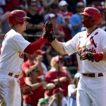 
              St. Louis Cardinals' Paul Goldschmidt, right, is congratulated by teammate Nolan Gorman after hitting a two-run home run during the seventh inning of a baseball game against the San Diego Padres Monday, May 30, 2022, in St. Louis. (AP Photo/Jeff Roberson)
            