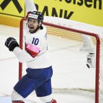 
              Scott Conway of Great Britain celebrates 3-3 goal during the 2022 IIHF Ice Hockey World Championships preliminary round group B match between Norway and Great Britain in Tampere, Finland, Sunday May 15, 2022. (Emmi Korhonen/Lehtikuva via AP)
            