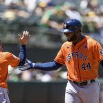 
              Houston Astros' Yordan Alvarez (44) celebrates with Jose Altuve (27) after hitting a solo home run against the Oakland Athletics during the fourth inning of a baseball game in Oakland, Calif., Monday, May 30, 2022. (AP Photo/John Hefti)
            