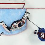 
              Edmonton Oilers goaltender Mikko Koskinen (19) makes a save against Colorado Avalanche center Nazem Kadri (91) during the third period in Game 1 of the NHL hockey Stanley Cup playoffs Western Conference finals Tuesday, May 31, 2022, in Denver. (AP Photo/Jack Dempsey)
            
