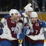 
              Colorado Avalanche players celebrate after a goal by Valeri Nichushkin (13) during the third period in Game 4 of an NHL hockey first-round playoff series against the Nashville Predators Monday, May 9, 2022, in Nashville, Tenn. The Avalanche won 5-3 to sweep the series 4-0. (AP Photo/Mark Humphrey)
            