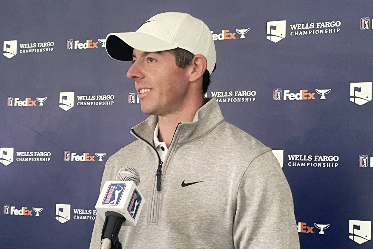 Rory McIlroy speaks to reporters at the Wells Fargo Championship golf tournament at TPC Potomac at ...