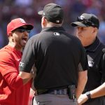 
              St. Louis Cardinals manager Oliver Marmol, left, argues with umpires Dan Bellino, center, and Andy Fletcher during the fifth inning of a baseball game against the Milwaukee Brewers Saturday, May 28, 2022, in St. Louis. (AP Photo/Jeff Roberson)
            