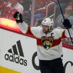 
              Florida Panthers center Aleksander Barkov (16) celebrates his goal during the third period of Game 6 in the first round of the NHL Stanley Cup hockey playoffs against the Washington Capitals, Friday, May 13, 2022, in Washington. (AP Photo/Alex Brandon)
            