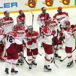 
              Denmark's players celebrate after winning the group A Hockey World Championship match between Canada and Denmark in Helsinki, Finland, Monday May 23 2022. (AP Photo/Martin Meissner)
            
