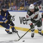 
              Minnesota Wild's Frederick Gaudreau (89) works the puck against St. Louis Blues' Jordan Kyrou (25) during the first period in Game 4 of an NHL hockey Stanley Cup first-round playoff series on Sunday, May 8, 2022, in St. Louis. (AP Photo/Michael Thomas)
            