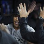 
              New York Yankees' Giancarlo Stanton is congratulated in the dugout after his two-run home run against the Toronto Blue Jays during the ninth inning of a baseball game Tuesday, May 3, 2022, in Toronto. (Nathan Denette/The Canadian Press via AP)
            