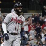 
              Atlanta Braves' Marcell Ozuna reacts after hitting a home run during the third inning of a baseball game against the Milwaukee Brewers Wednesday, May 18, 2022, in Milwaukee. (AP Photo/Morry Gash)
            