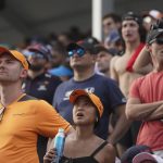 
              Spectators react as they watch the Formula One Miami Grand Prix auto race at the Miami International Autodrome, Sunday, May 8, 2022, in Miami Gardens, Fla. (AP Photo/Wilfredo Lee)
            