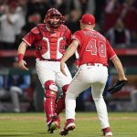 
              Los Angeles Angels starting pitcher Reid Detmers (48) celebrates with catcher Chad Wallach (35) after throwing a no hitter against the Tampa Bay Rays in a baseball game in Anaheim, Calif., Tuesday, May 10, 2022. The Angels won 12-0. (AP Photo/Ashley Landis)
            