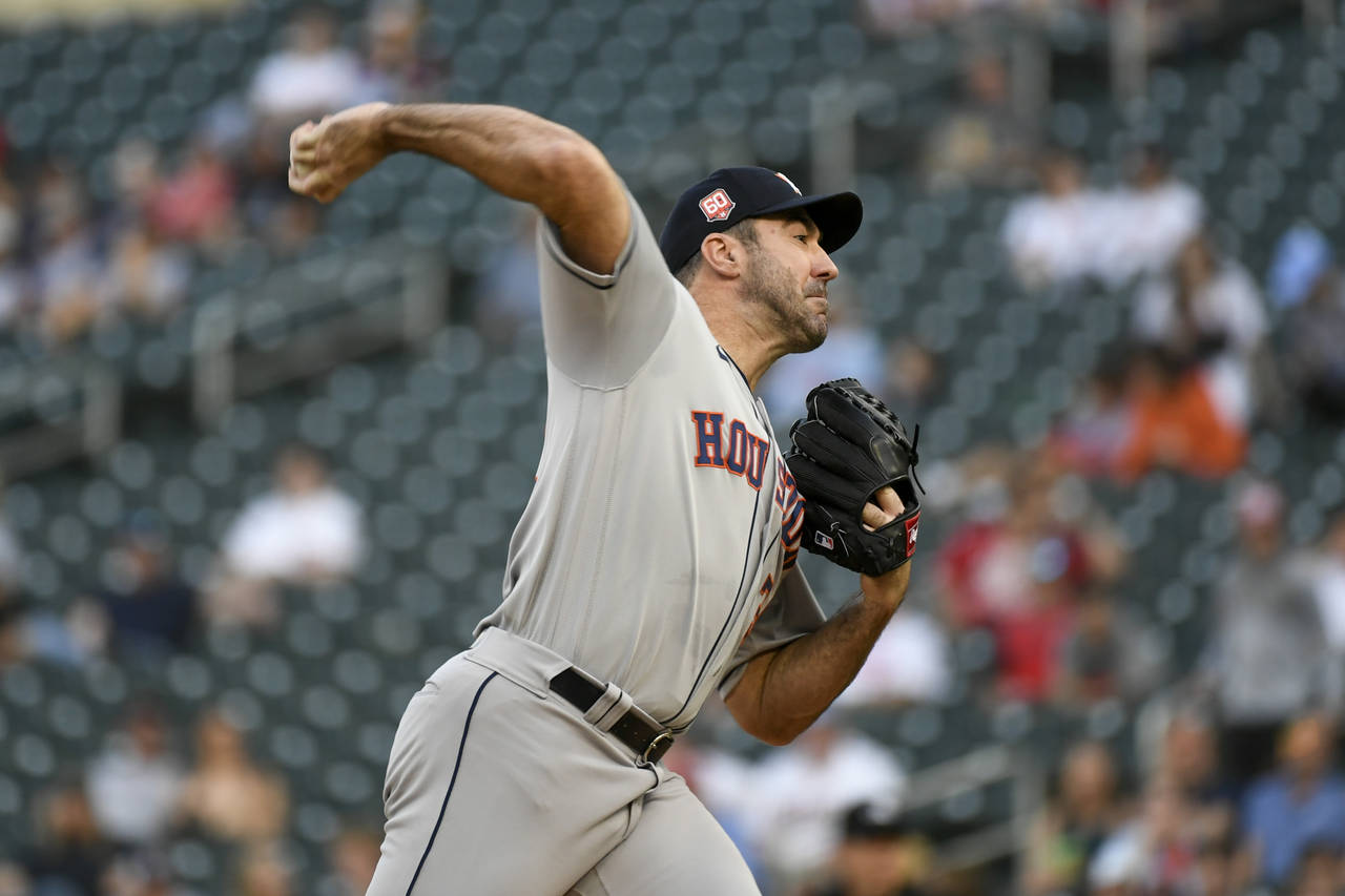 Houston Astros pitcher Justin Verlander throws against the Minnesota Twins during the first inning ...