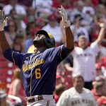 
              Milwaukee Brewers' Lorenzo Cain celebrates as he arrives home after hitting a two-run home run during the eighth inning of a baseball game against the St. Louis Cardinals Sunday, May 29, 2022, in St. Louis. (AP Photo/Jeff Roberson)
            