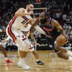 
              Philadelphia 76ers guard James Harden (1) drives to the basket as Miami Heat guard Max Strus (31) defends, during the first half of Game 1 of an NBA basketball second-round playoff series, Monday, May 2, 2022, in Miami. (AP Photo/Marta Lavandier)
            