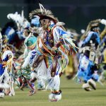 
              Performers dance during Arizona Diamondbacks Native American Recognition Day prior to a baseball game between the Los Angeles Dodgers and the Diamondbacks Sunday, May 29, 2022, in Phoenix. (AP Photo/Ross D. Franklin)
            