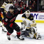
              Carolina Hurricanes' Vincent Trocheck (16) celebrates a goal by  Sebastian Aho, not seen, on Boston Bruins goaltender Linus Ullmark (35) during the second period of Game 2 of an NHL hockey Stanley Cup first-round playoff series in Raleigh, N.C., Wednesday, May 4, 2022. (AP Photo/Karl B DeBlaker)
            