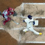 
              Milwaukee Brewers' Rowdy Tellez hits a grand slam during the third inning of a baseball game against the Cincinnati Reds Wednesday, May 4, 2022, in Milwaukee. (AP Photo/Morry Gash)
            