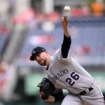 
              Colorado Rockies starting pitcher Austin Gomber throws during the first inning of the first baseball game of a doubleheader against the Washington Nationals, Saturday, May 28, 2022, in Washington. (AP Photo/Nick Wass)
            