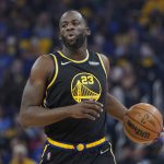 
              Golden State Warriors forward Draymond Green brings the ball up against the Memphis Grizzlies during the first half of Game 3 of an NBA basketball Western Conference playoff semifinal in San Francisco, Saturday, May 7, 2022. (AP Photo/Jeff Chiu)
            