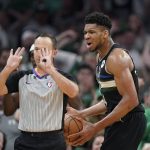 
              Milwaukee Bucks forward Giannis Antetokounmpo, right, disagrees with a call during the second half of Game 7 of an NBA basketball Eastern Conference semifinals playoff series against the Boston Celtics, Sunday, May 15, 2022, in Boston. (AP Photo/Steven Senne)
            
