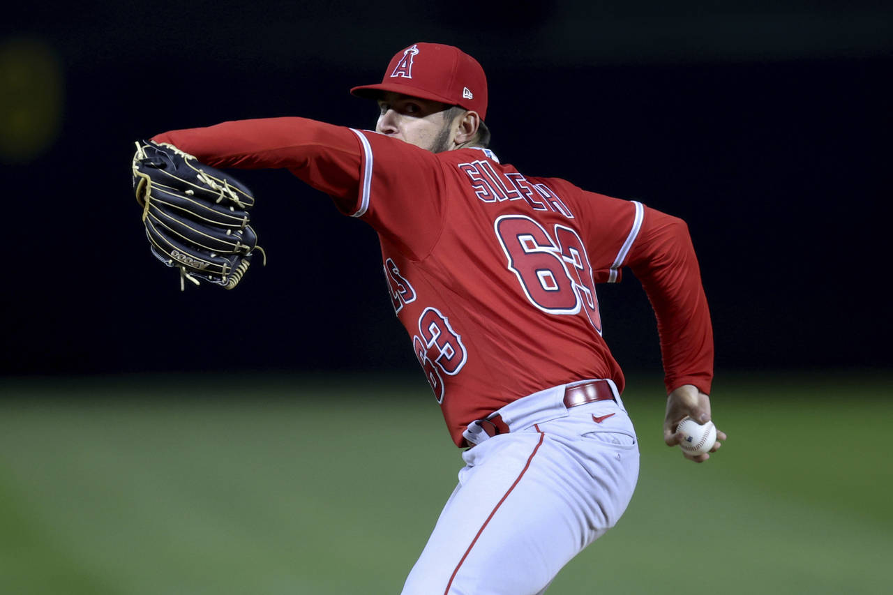 Los Angeles Angels' Chase Silseth pitches against the Oakland Athletics during the sixth inning of ...