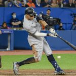 
              New York Yankees' Aaron Judge (99) strikes out swinging during the eighth inning of the team's baseball game against the Toronto Blue Jays on Wednesday, May 4, 2022, in Toronto. (Christopher Katsarov/The Canadian Press via AP)
            