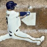 
              Milwaukee Brewers' Jace Peterson hits a single during the seventh inning of a baseball game against the Atlanta Braves Monday, May 16, 2022, in Milwaukee. (AP Photo/Morry Gash)
            