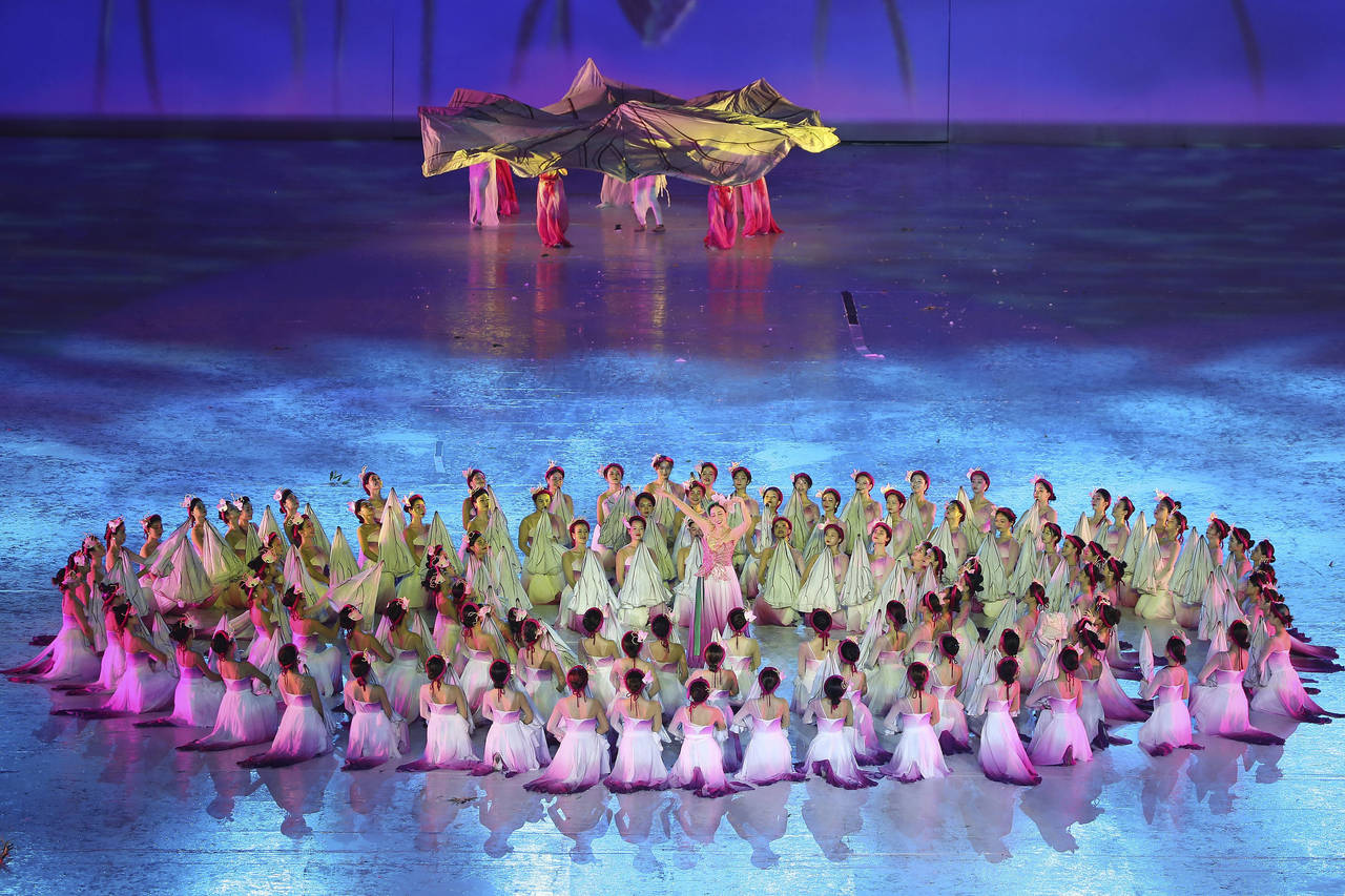 Dancers perform during the opening ceremony of the 31st Southeast Asian Games in Hanoi, Vietnam Sun...