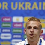 
              Ukraine's Oleksandr Zinchenko reacts, during a press conference, at Hampden Park, in Glasgow, Scotland, Tuesday May 31, 2022. Scotland will play Ukraine in a World Cup qualifier soccer match on Wednesday. (Andrew Milligan/PA via AP)
            