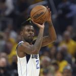 
              Dallas Mavericks forward Reggie Bullock shoots against the Golden State Warriors during the first half of Game 1 of the NBA basketball playoffs Western Conference finals in San Francisco, Wednesday, May 18, 2022. (AP Photo/Jed Jacobsohn)
            