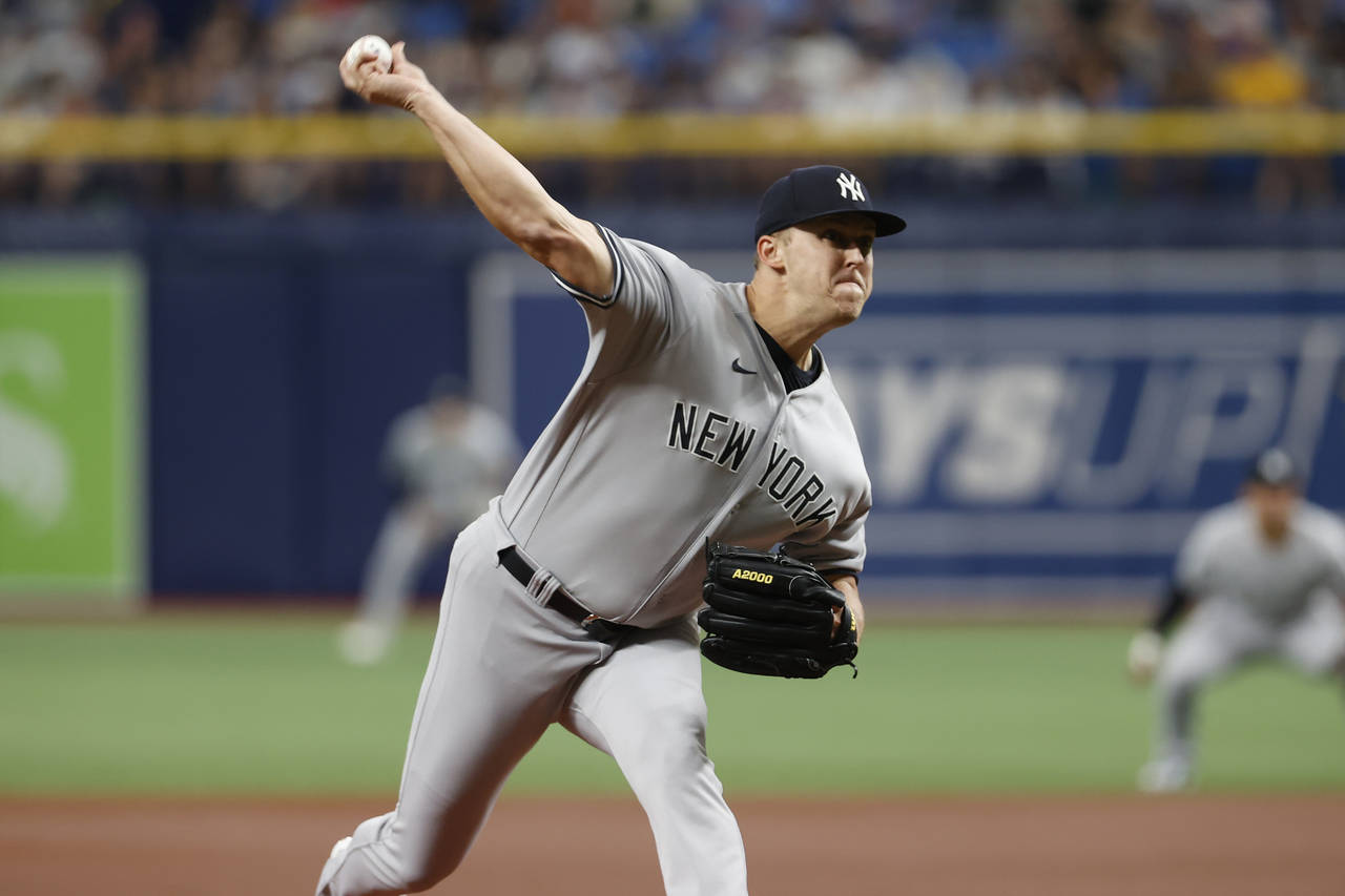 New York Yankees starting pitcher Jameson Taillon throws to a Tampa Bay Rays batter during the firs...