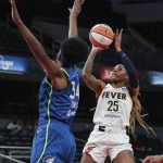 
              Indiana Fever guard Tiffany Mitchell (25) shoots the ball against Minnesota Lynx center Sylvia Fowles (34) during a WNBA basketball game,  Tuesday, May 10, 2022, at Gainbridge Fieldhouse in Indianapolis.(Grace Hollars/The Indianapolis Star via AP)
            
