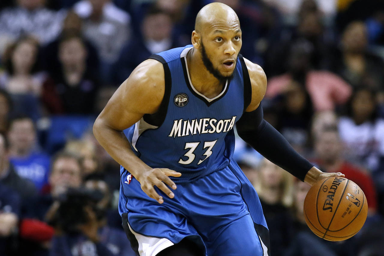FILE - Minnesota Timberwolves forward Adreian Payne (33) drives with the ball during the second hal...