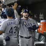 
              Tampa Bay Rays' Mike Zunino, right, celebrates his three-run home run with Harold Ramirez (43) during the fifth inning of a baseball game against the Baltimore Orioles, Friday, May 20, 2022, in Baltimore. (AP Photo/Nick Wass)
            