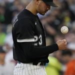 
              Chicago White Sox starting pitcher Vince Velasquez tosses the ball during the first inning of the team's baseball game against the New York Yankees in Chicago, Friday, May 13, 2022. (AP Photo/Nam Y. Huh)
            