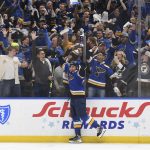 
              St. Louis Blues' Jordan Kyrou (25) celebrates after scoring a goal during the second period in Game 4 of an NHL hockey Stanley Cup first-round playoff series against the Minnesota Wild, Sunday, May 8, 2022, in St. Louis. (AP Photo/Michael Thomas)
            
