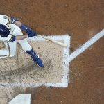 
              Milwaukee Brewers' Hunter Renfroe hits a double during the sixth inning of a baseball game against the Atlanta Braves Monday, May 16, 2022, in Milwaukee. (AP Photo/Morry Gash)
            