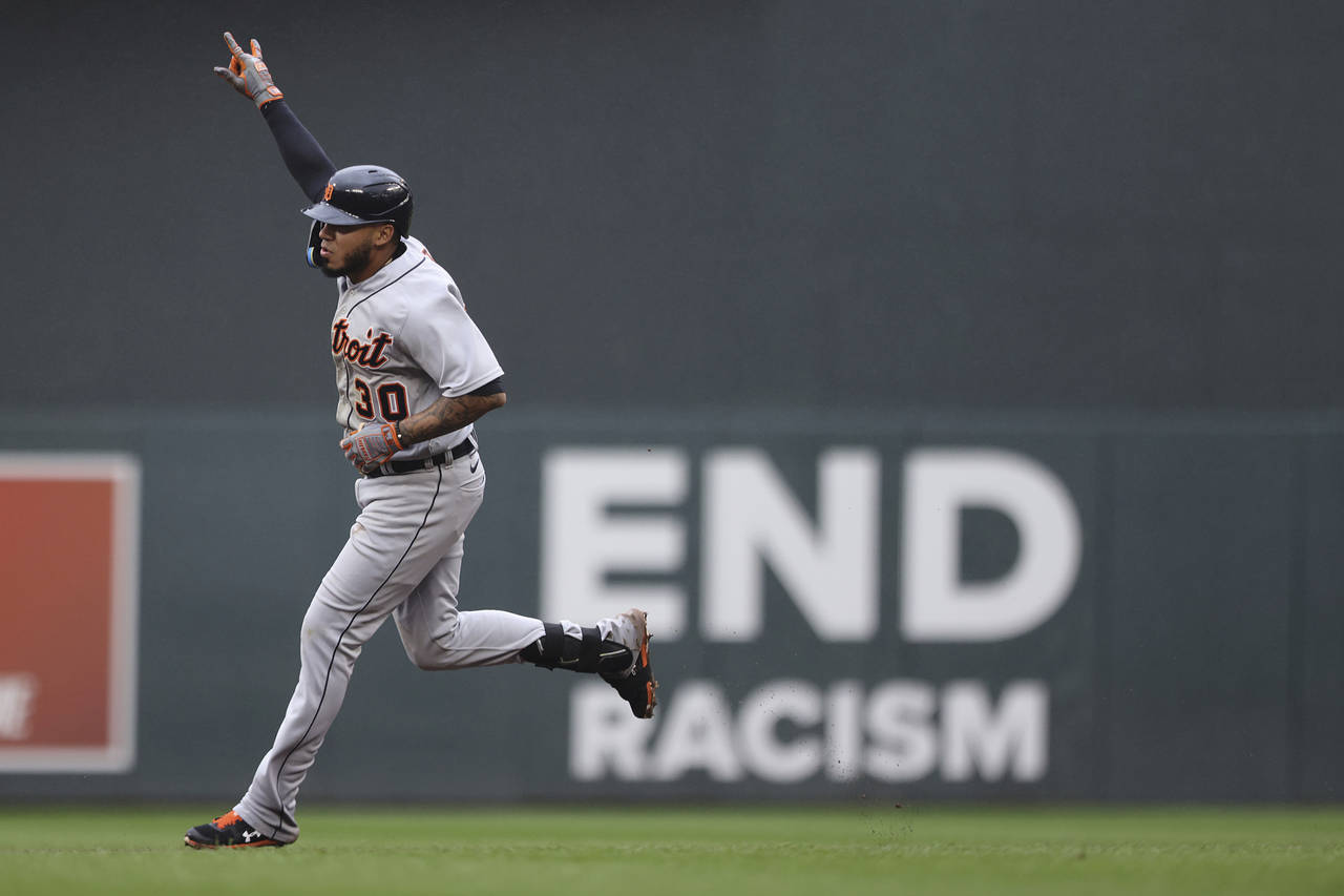 Detroit Tigers' Harold Castro gestures after hitting a home run against the Minnesota Twins during ...