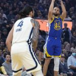
              Golden State Warriors guard Stephen Curry (30) takes a 3-point shot over Memphis Grizzlies center Steven Adams (4) during the first half of Game 6 of an NBA basketball Western Conference playoff semifinal in San Francisco, Friday, May 13, 2022. (AP Photo/Tony Avelar)
            