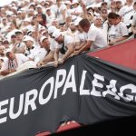
              Fans try to move a banner before the Europa League final soccer match between Eintracht Frankfurt and Rangers FC at the Ramon Sanchez Pizjuan stadium in Seville, Spain, Wednesday, May 18, 2022. (AP Photo/Pablo Garcia)
            