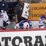 
              New York Rangers' Alexis Lafrenière (13) sits on the bench between Artemi Panarin (10) and Filip Chytil late in the third period in Game 3 of an NHL hockey Stanley Cup first-round playoff series in Pittsburgh, Saturday, May 7, 2022. (AP Photo/Gene J. Puskar)
            