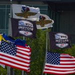 
              United States, Indianapolis Motor Speedway and IndyCar Series flags fly in heavy winds during practice for the IndyCar Indy 500 auto race at Indianapolis Motor Speedway in Indianapolis, Friday, May 20, 2022. (AP Photo/Michael Conroy)
            